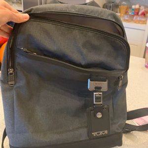 Backpack Tumi. Black/gray Fits a macbook